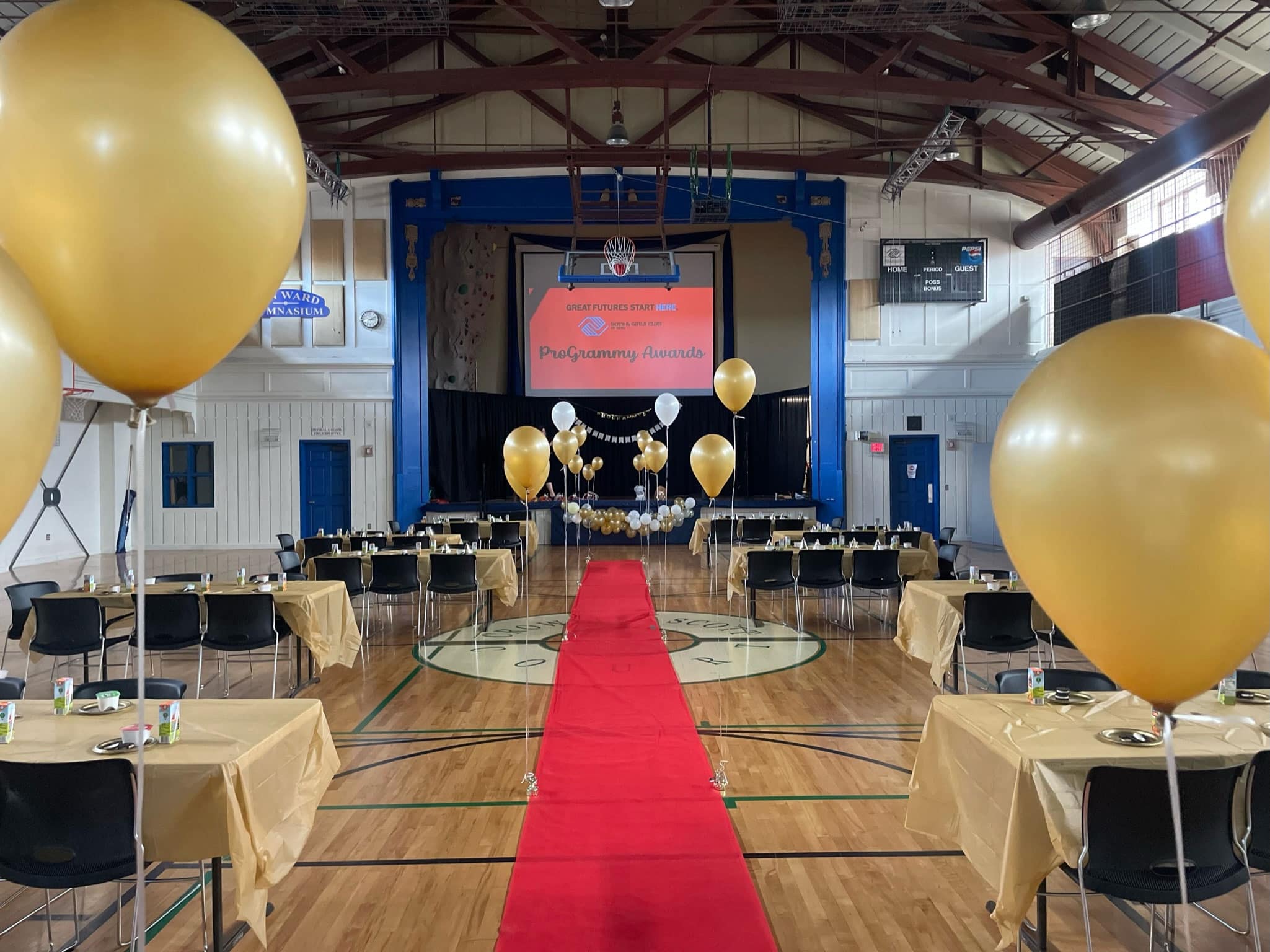 A basketball court decorated for a party